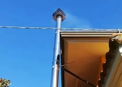 Smoke problem on chimney with curved or horizontal flue